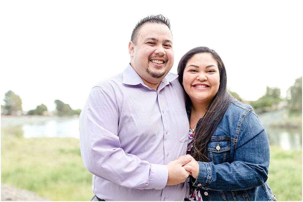 Couple smiling near the water at Niles Canyon