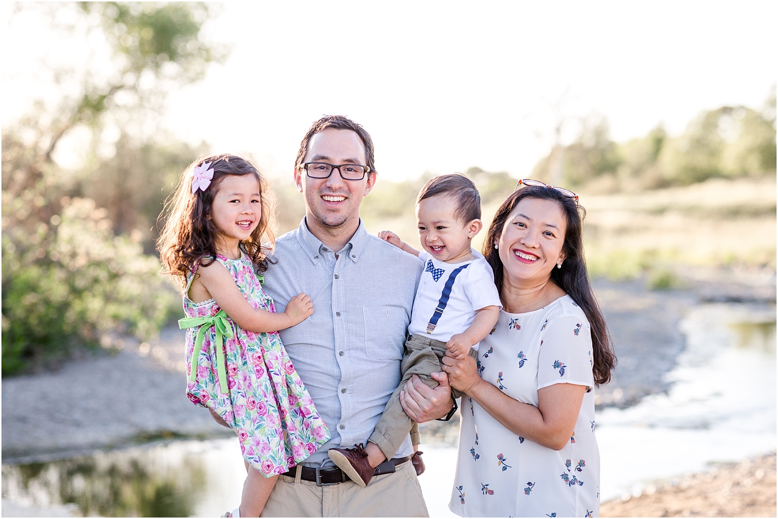 Family photo on the Arroyo Mocho Trail in Livermore, CA standing near the water
