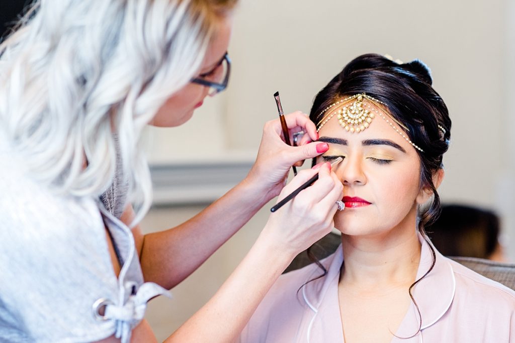 Bride getting makeup applied at Napa Silverado Resort, shot by Amber Rivas Photography
