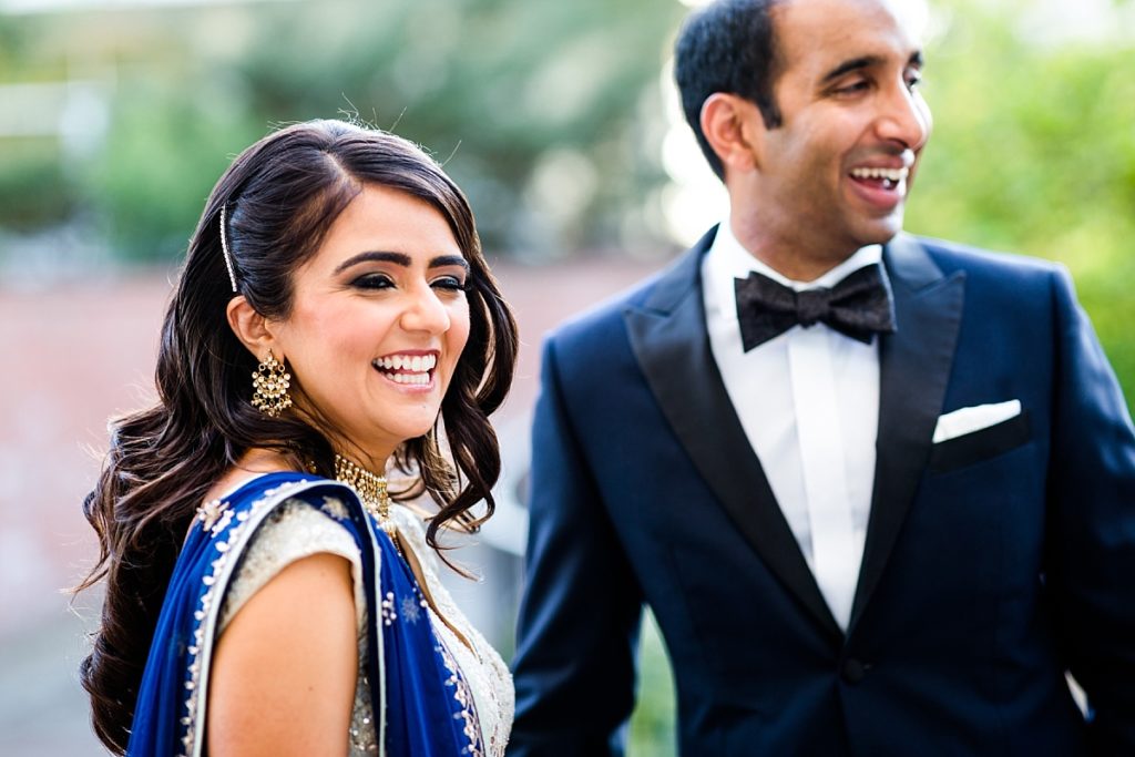 Groom gets first look of second gown for Indian wedding reception at Napa Silverado Resort, shot by Amber Rivas Photography