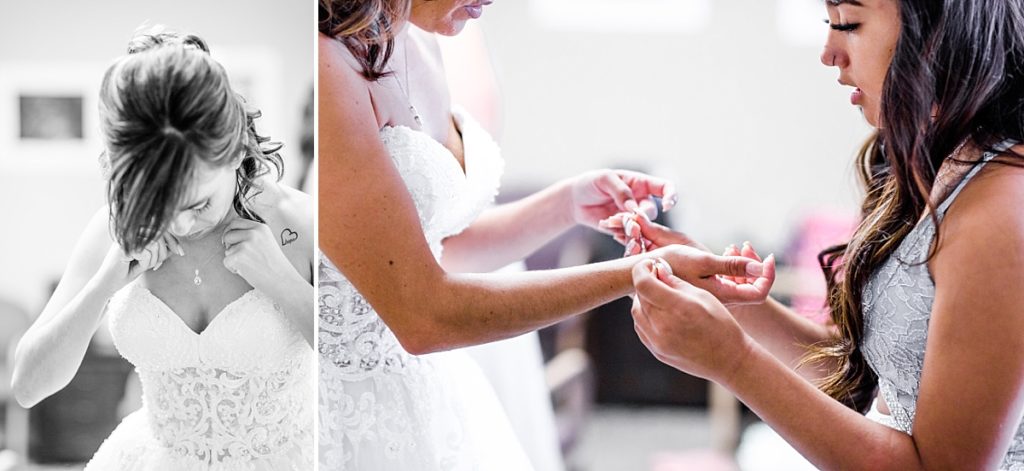 Bride putting on aquamarine necklace and daughter helping to put on a bracelet. Shot by Amber Rivas Photography.
