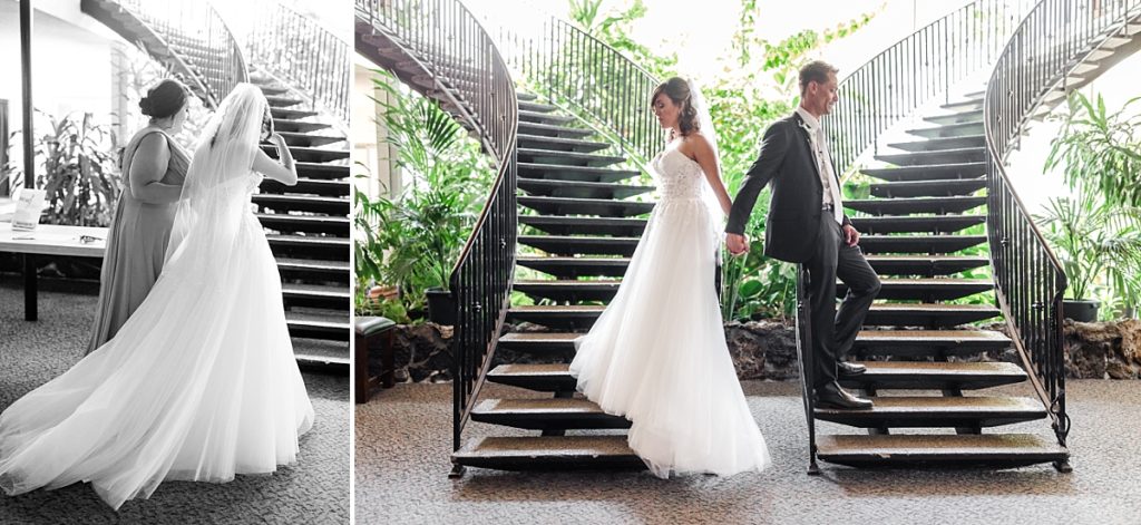 Bride and groom praying together back-to-back before the ceremony begins. Double staircase in the lobby of Ceres Seventh-day Adventist Church. Shot by Amber Rivas Photography.