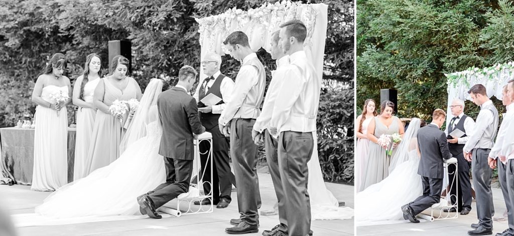 Bride and groom kneeling at the altar of wedding ceremony in the church courtyard at Ceres Seventh-day Adventist Church. Shot by Amber Rivas Photography.