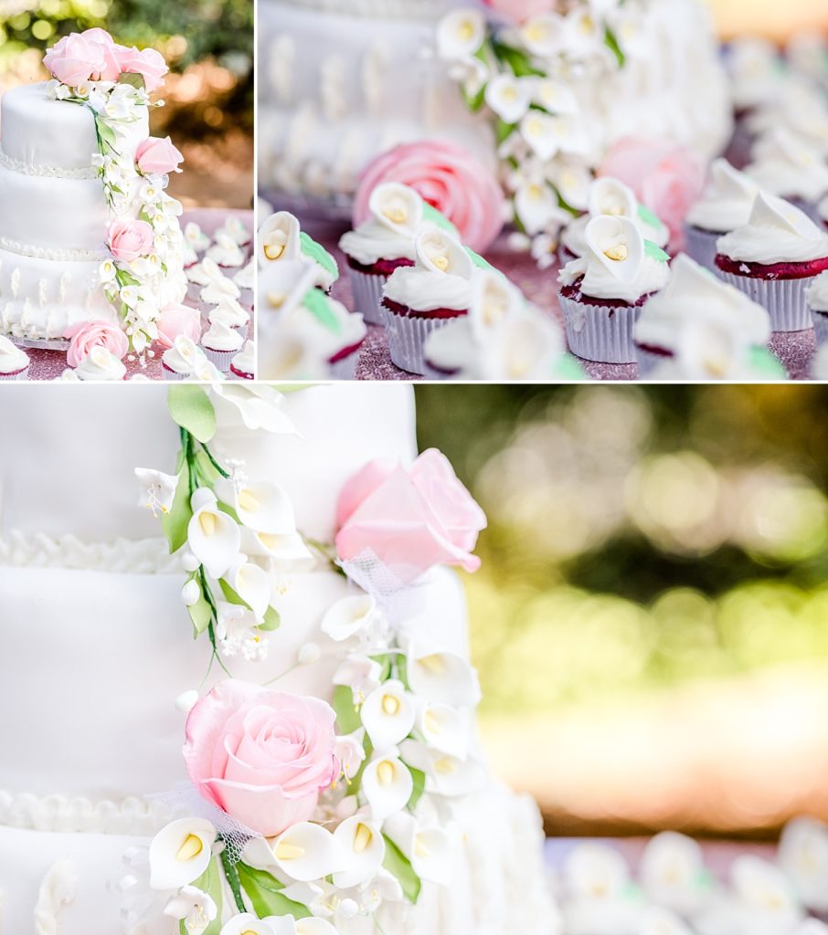 White cake with pink roses and white calla lillies surrounded by cupcakes. Shot by Amber Rivas Photography.