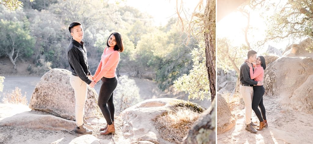 Mt Diablo engagement session with big rocks. Couple holds hands in front of scenic overlook.