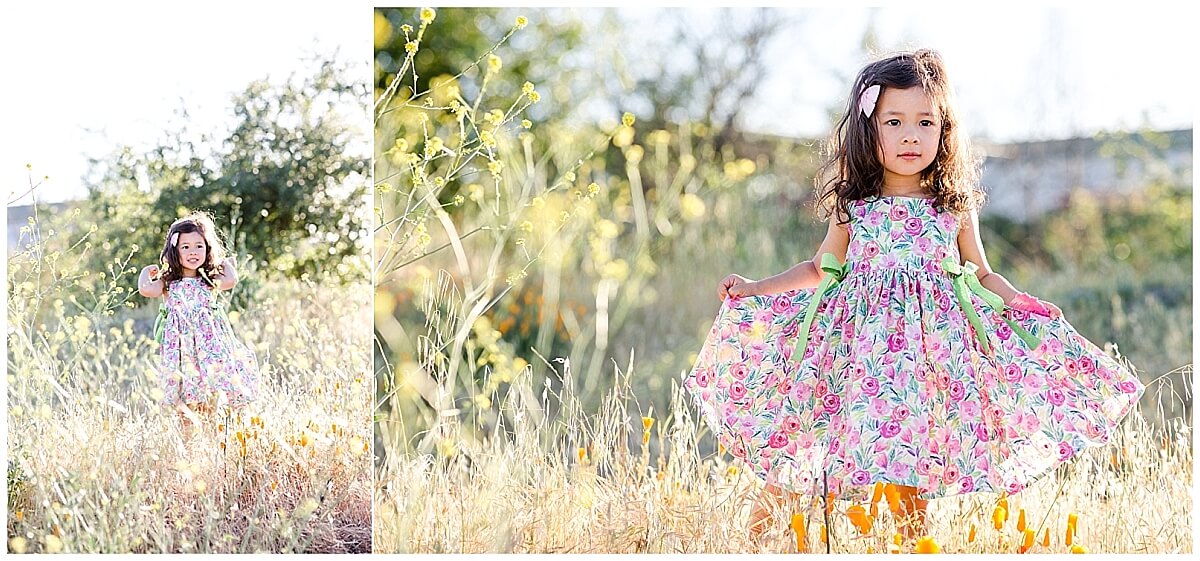 Girl in hand-sewn dress twirling in wildflower field