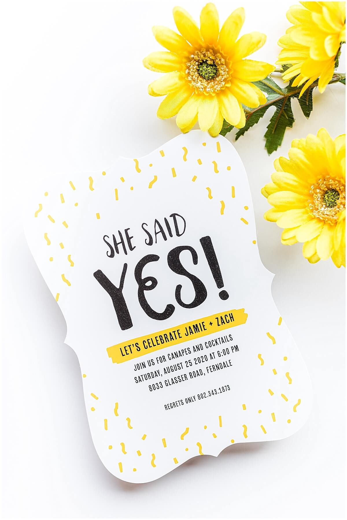Yellow confetti engagement party invitation that says "She said YES!"