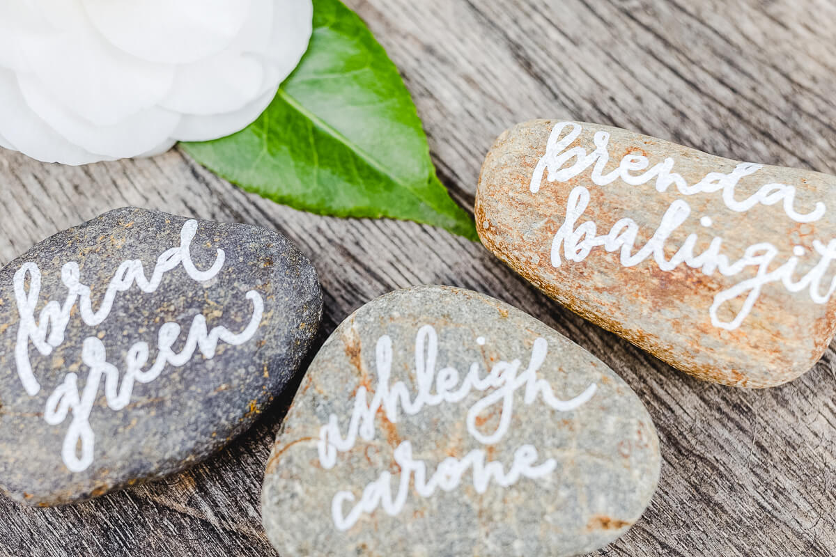Hand lettering on river rock