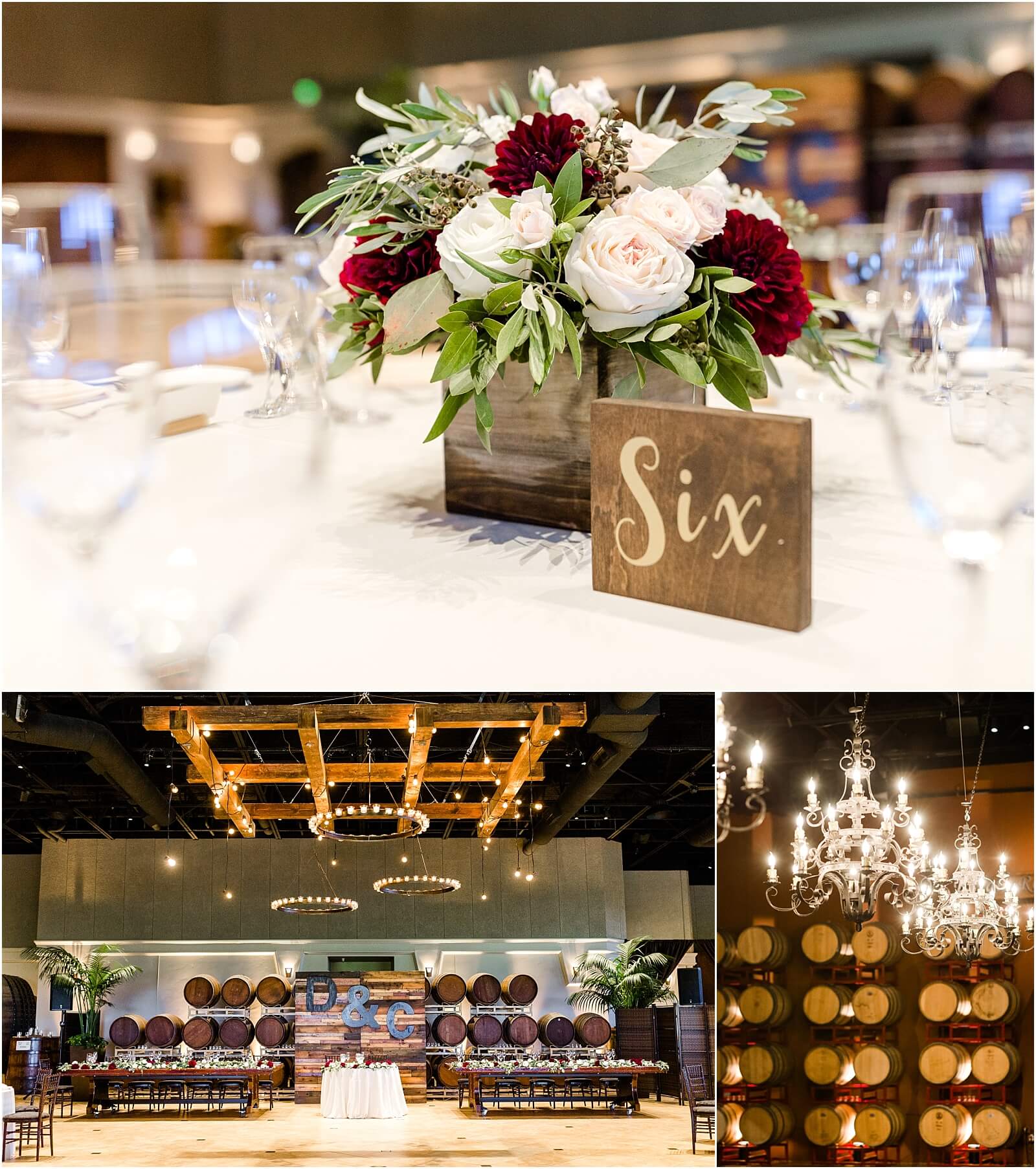 Reception table with wood sign, burgundy dahlias and white roses centerpiece. Wedding with wine barrel decor at Palm Event Center in Pleasanton, CA.