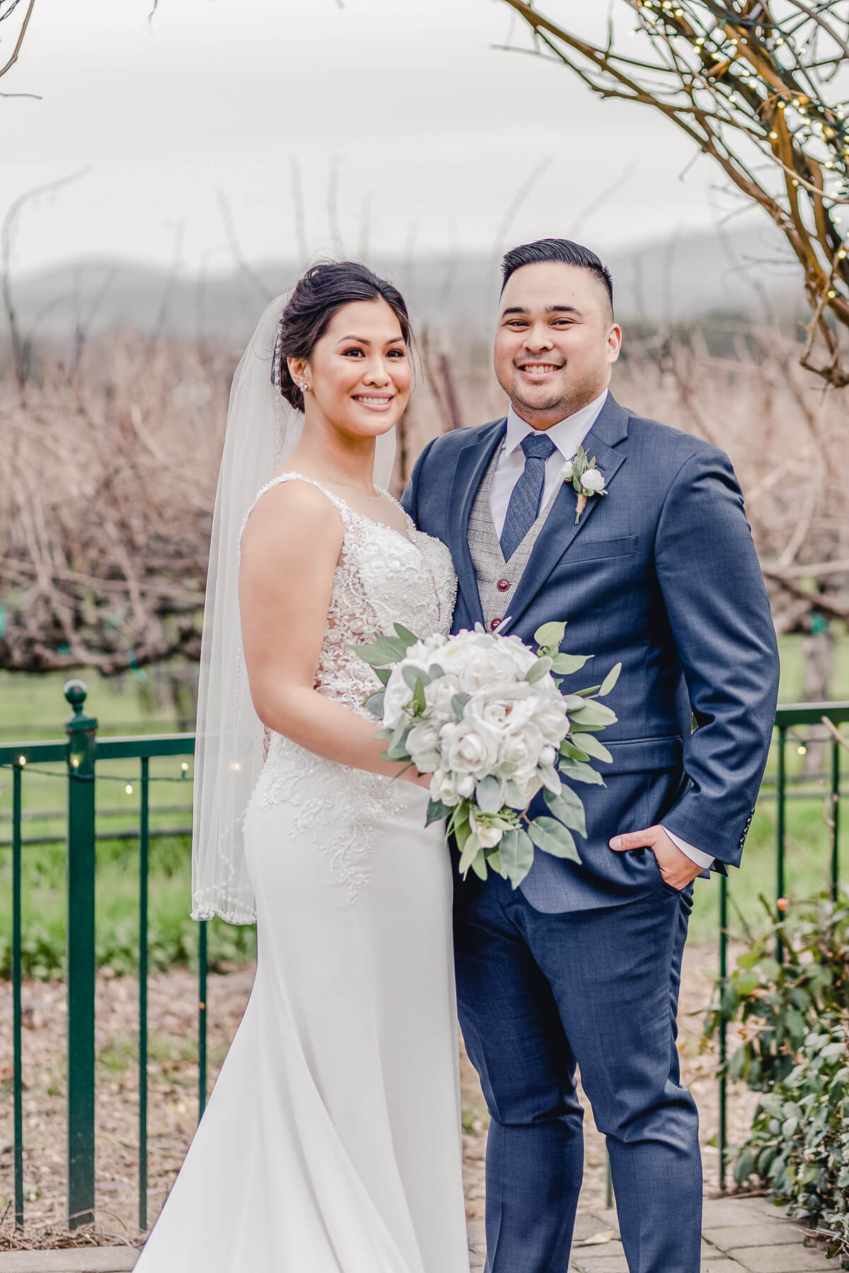 Groom and bride portrait at their winter wedding