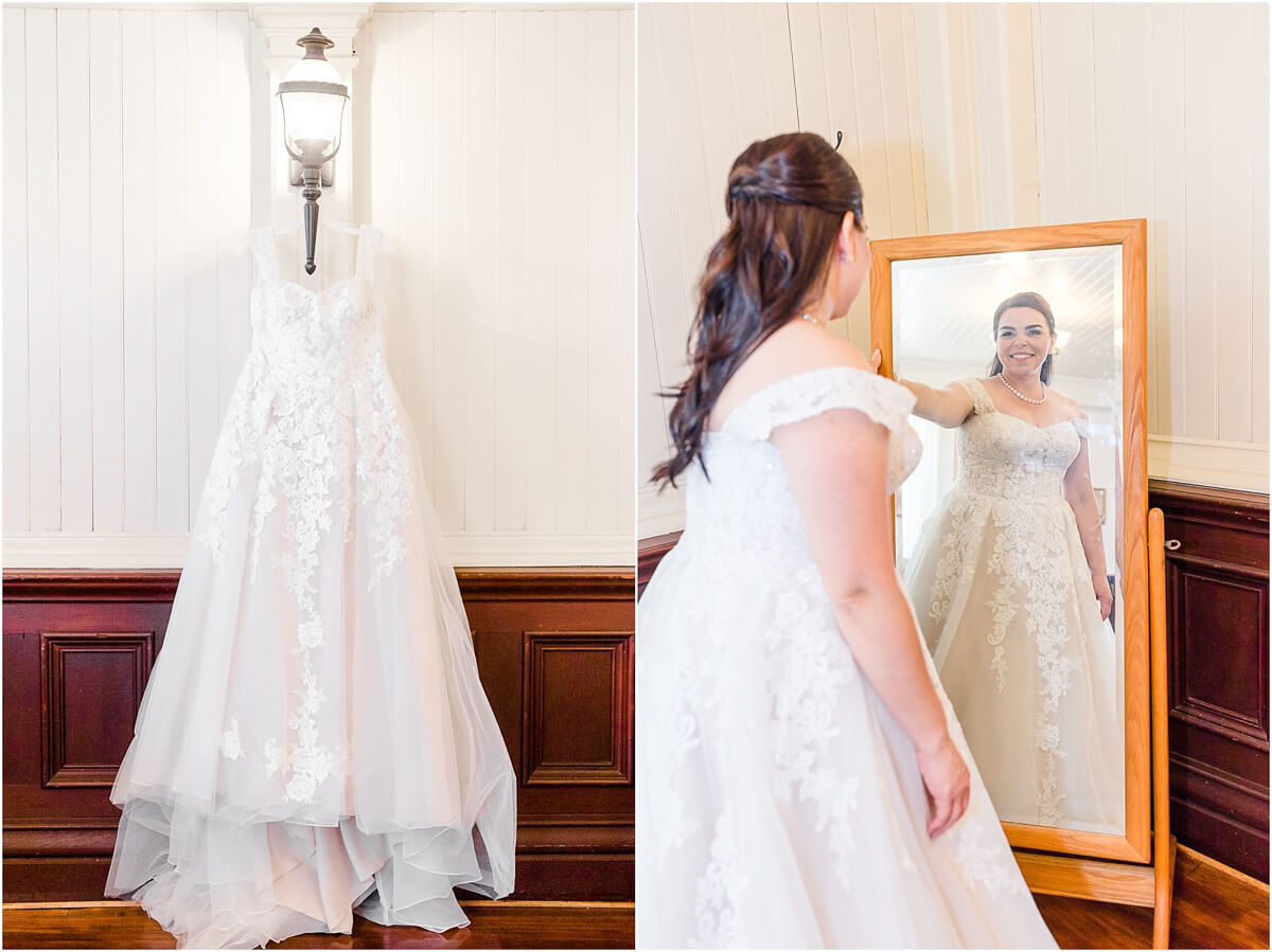 Bride looks in mirror for the first time after putting on wedding dress