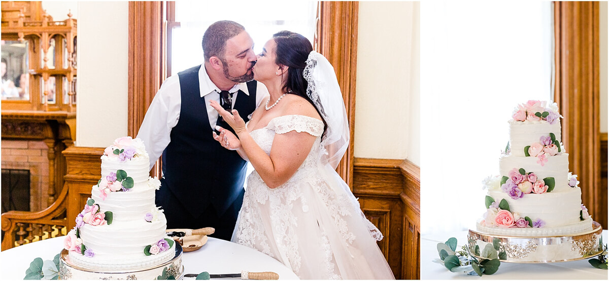 Bride and groom share a kiss after cutting the cake