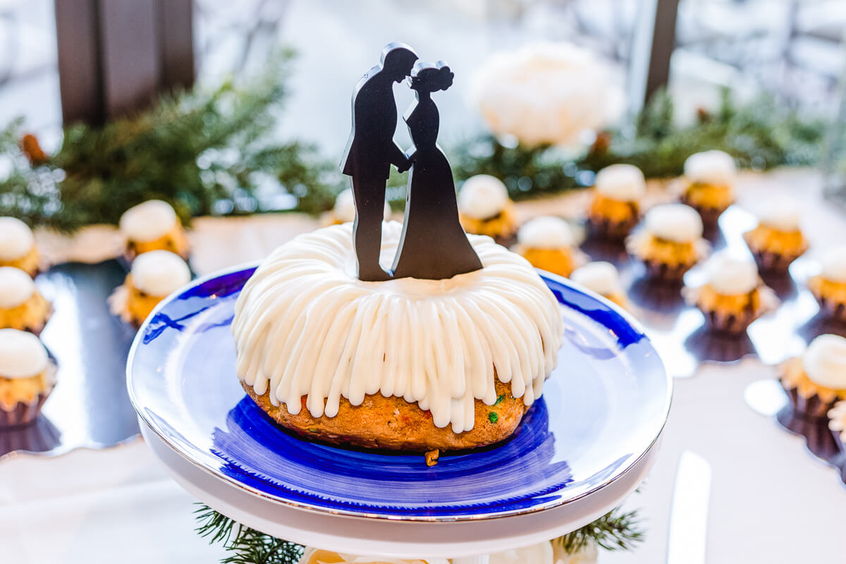 Bundt cake with silhouette wedding cake topper